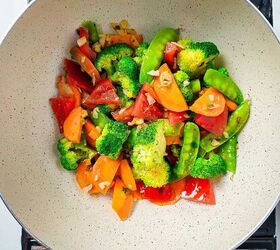 homemade shrimp and vegetable stir fry in 30 minutes, Colorful vegetables saut ing in a wok for shrimp and vegetable stir fry