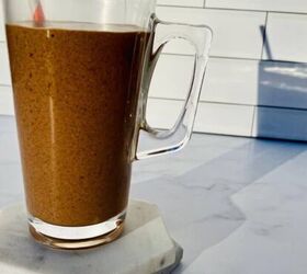 blueberry protein shake, A snickers smoothie in a clear glass with a red and white straw