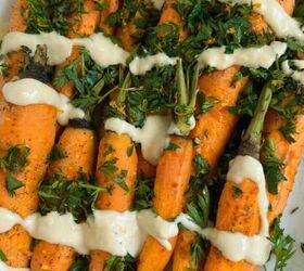 mediterranean roasted zucchini slices, Roasted carrots with tahini sauce and a gremolata on a white platter