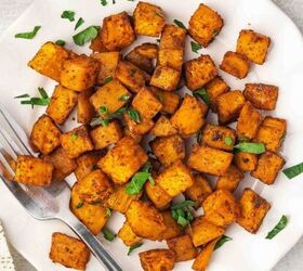 easy oven roasted green beans with garlic and lemon, Top view of crispy roasted sweet potatoes served on a white plate with parsley garnish