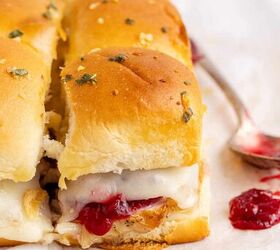 turkey sliders, Turkey Sliders Topped with Cheese and Cranberry Sauce on a Cutting Board