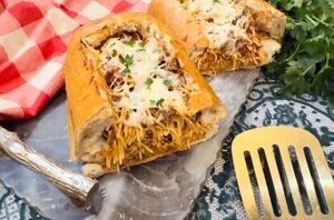 Stuff garlic bread with spaghetti for the ultimate hearty Italian meal