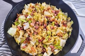 Tender cabbage cooked with smoky bacon and caramelized onions in one pan—what could be better?
