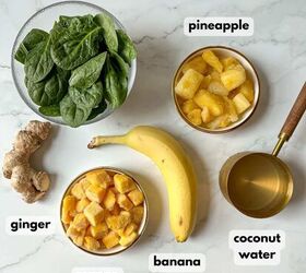detox island green smoothie tropical smoothie cafe copycat, Ingredients need to make a detox island green smoothie are on a marble countertop