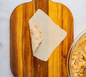 buffalo chicken egg rolls air fryer recipe, Egg roll wrapper wrapped around buffalo chicken mixture