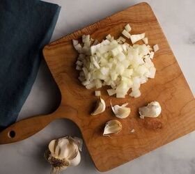 homemade ketchup, onions and garlic on cutting board