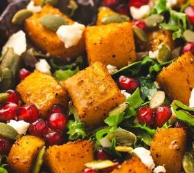 easy roasted butternut squash feta salad holiday side salad, Golden cubes of roasted squash with creamy feta and crunchy pumpkin seeds on a platter