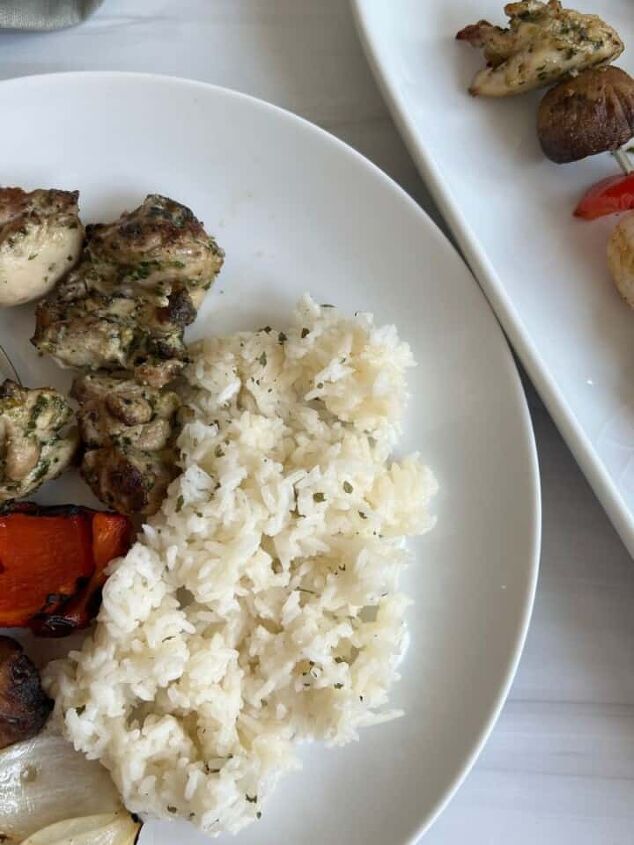 juicy chicken marsala thighs gf one skillet, Grilled Chicken Kabobs on a white plate with a pesto marinade and rice