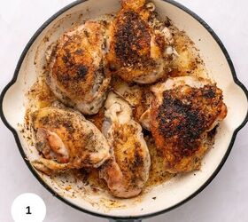 juicy chicken marsala thighs gf one skillet, Five seasoned browned chicken thighs cook in a round white enameled skillet with a gray handle sitting on a light surface This one skillet meal makes the chicken appear crispy and perfectly cooked