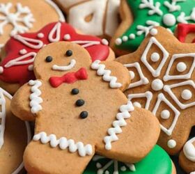 cute and easy marshmallow snowmen for the holidays, Assorted festive Christmas cookies decorated with colorful icing including gingerbread men snowflakes stars and candy cane shapes