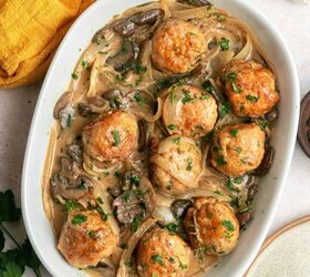 chicken marsala meatballs gf one pan, One Pan Chicken Marsala Meatballs in a creamy mushroom and onion sauce garnished with parsley served in a white oval dish A yellow cloth napkin and fresh herbs are partially visible beside this gluten free meal