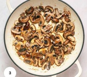 chicken marsala meatballs gf one pan, Sliced mushrooms being saut ed in a white enameled pan showing some browning This one pan scene highlights the rich flavors developing The number 3 appears in a white circle at the bottom left corner