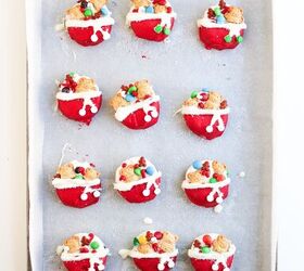 easy christmas oreos santa s toy bag oreos recipe, A tray of finished Christmas Oreo cookies decorated with red and white chocolate and festive toppings