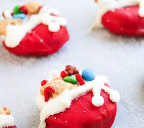 easy christmas oreos santa s toy bag oreos recipe, Close up of a festive Christmas Oreo dipped in red and white chocolate and decorated with candy and teddy bear crackers