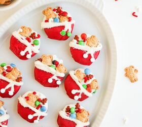 easy christmas oreos santa s toy bag oreos recipe, Festive Christmas Oreos arranged on a white platter with holiday sprinkles mini candy canes and teddy grahams