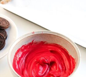 easy christmas oreos santa s toy bag oreos recipe, A bowl filled with smooth melted red chocolate candy coating ready for dipping cookies