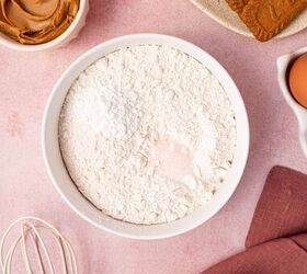 biscoff blondies with white chocolate cookie butter, Dry ingredients being added to the bowl for making biscoff blondies