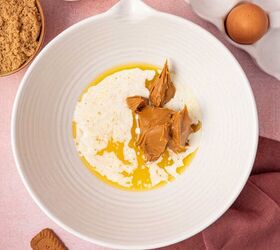 biscoff blondies with white chocolate cookie butter, Wet ingredients being added to the bowl to make biscoff blondies