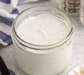 easy christmas crack recipe, Creamy Horseradish Sauce in a mason jar from above with horseradish on a small plate beside