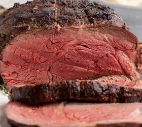 easy christmas crack recipe, Reverse Sear Beef Tenderloin sliced on a platter with mashed potatoes in the back