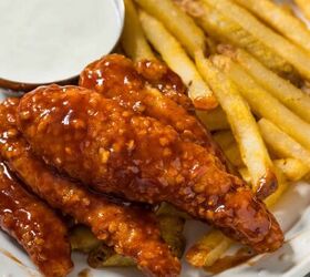 honey bbq chicken recipe honey barbecue chicken tenders, Close up image of Honey BBQ Chicken Tenders on a plate with fries and ranch dressing