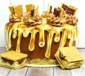 smores cake, a smores cake with chocolate frosting graham cracker crumbs toasted marshmallow meringue and hershey bars
