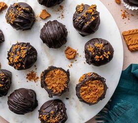 biscoff truffles recipe easy no bake cookie truffles, Overhead shot of homemade Biscoff truffles with crushed cookies scattered around perfect for gifting during the holiday season