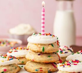 funfetti birthday cake cookies with sprinkles recipe, Birthday candle being placed on a stack of funfetti birthday cake cookies