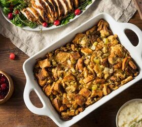sausage stuffing recipe classic sage and sausage stuffing, Overhead image of Sausage Stuffing in a baking dish next to sliced turkey