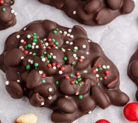 pretzel christmas treats, Crockpot Candy Chocolate Peanut Clusters with Sprinkles on Parchment Paper