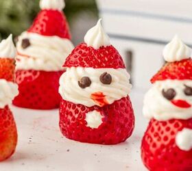 christmas crunch recipe easy holiday snack mix, Close up of Strawberry Santas made with fresh strawberries cream cheese frosting and mini chocolate chip eyes cute and festive Christmas dessert