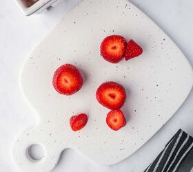 strawberry santas easy no bake christmas dessert, The bottom and top of the fresh strawberries are sliced