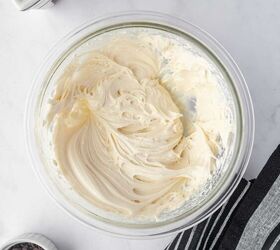 strawberry santas easy no bake christmas dessert, Cream cheese frosting is mixed and kept in a glass bowl