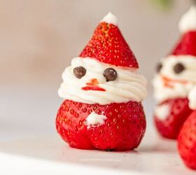 strawberry santas easy no bake christmas dessert, Close up of Strawberry Santas made with fresh strawberries cream cheese frosting and mini chocolate chip eyes cute and festive Christmas dessert