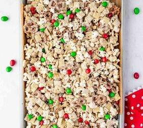 christmas crunch recipe easy holiday snack mix, Tray of Christmas candy mix with melted white chocolate coating ready to cool and set