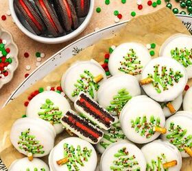 easy no bake white chocolate covered oreos 5 ingredient christmas tre, White chocolate covered Oreos with red cream filling displayed on a Christmas dessert tray