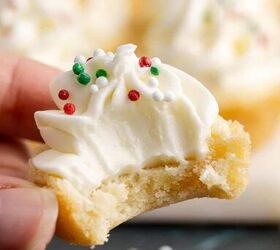 sugar cookie cups, Sugar Cookie Cups with Frosting and Sprinkles held up with a bite taken