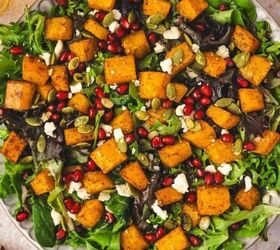 easy roasted pumpkin salad with feta balsamic vinaigrette, Golden roasted butternut squash cubes with crumbled feta and pumpkin seeds ready to serve