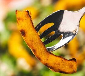 easy roasted pumpkin salad with feta balsamic vinaigrette, Close up shot of a roasted pumpkin strip showing its caramelized edges and tender texture