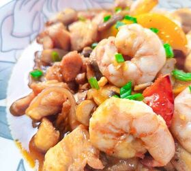 easy and delicious chicken and shrimp stir fry recipe, Close up view of shrimp chicken and mushrooms coated in savory stir fry sauce
