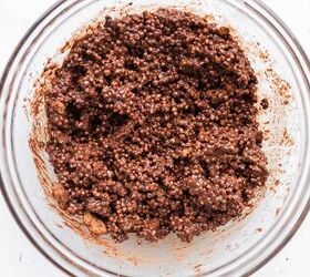 easy 5 ingredient biscoff chocolate quinoa clusters no bake christmas, Melted chocolate and Biscoff mixture in a bowl with puffed quinoa mixed