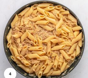 french onion pasta with gruyere cheese, A skillet filled with penne pasta tossed in a creamy light colored sauce with shredded chicken and melted Gruy re The number 4 appears in a white circle in the bottom left corner