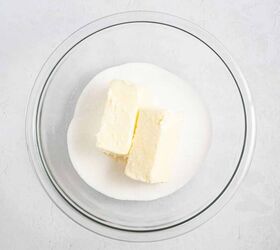 best eggnog pound cake rum eggnog glaze, A glass bowl containing two sticks of butter placed on top of a pile of granulated white sugar set on a light textured surface