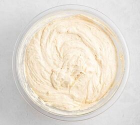 best eggnog pound cake rum eggnog glaze, A glass bowl filled with creamy light beige cake batter sitting on a white textured surface