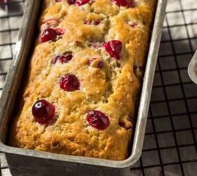 cranberry cake recipe easy cranberry loaf cake, Cranberry Cake in a loaf pan on a cooling rack