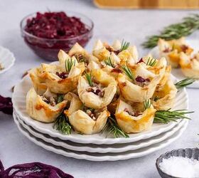 cranberry brie bites, Plate of Cranberry Brie Bites Stacked and Garnished with Fresh Rosemary