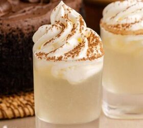 3 wise men shot, Chocolate Cake Shot in Shot Glasses and Garnished with Whipped Cream and Cocoa Powder with Chocolate Cake in Background