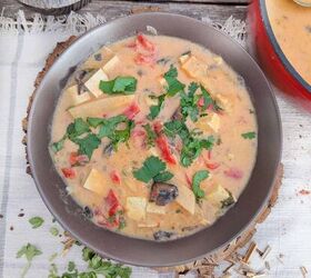 spicy tofu sausage bean soup with rice, A bowl of creamy Thai soup with cilantro and bamboo shoots