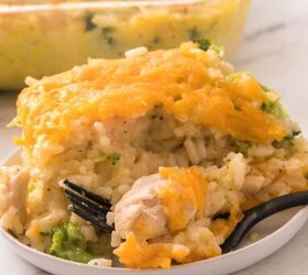 easy chicken broccoli rice casserole family favorite, Soft and creamy chicken broccoli rice bake served with a fork taking a bite