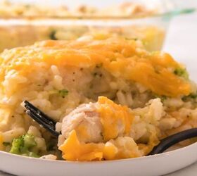 easy chicken broccoli rice casserole family favorite, Cheddar topped chicken broccoli rice casserole on a plate with a fork ready to enjoy